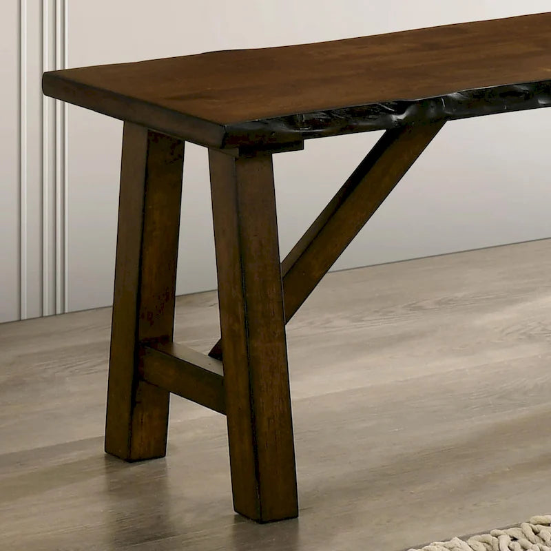 Banc rustique en bois massif à bords naturels avec piètement à tréteaux