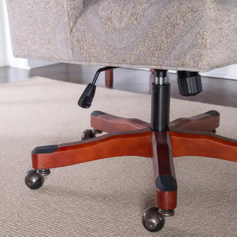 Chaise de bureau pivotante tapissée avec garniture cloutée